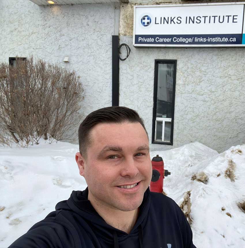 John Jackson in front of LINKS Institute Office